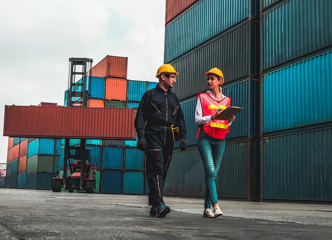 Operations team inspecting containers at a container yard